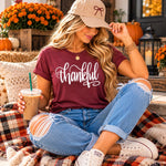 Thankful Tee - model sitting with iced coffee, baseball cap