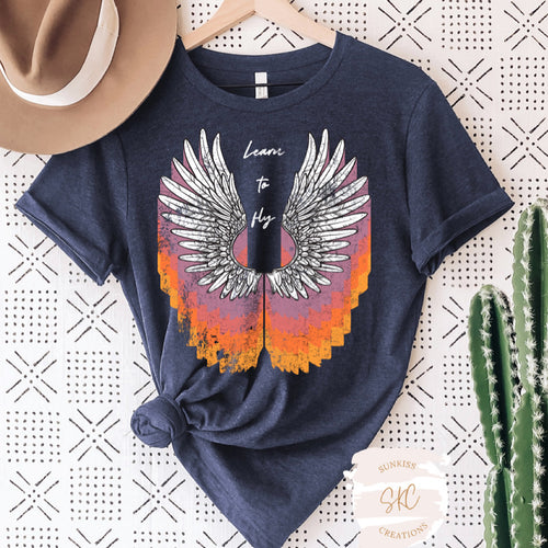 Learn to Fly Wings Tee - SKC Boutique